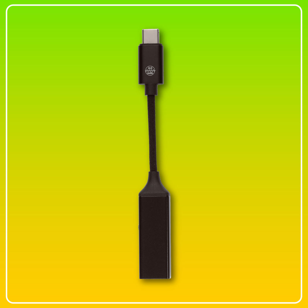 ALO Audio Pilot 2 front over green-yellow gradient background