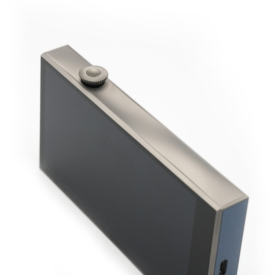 Astell&Kern SE300 Titan 3 quarter front edge highlighting volume knob over white background