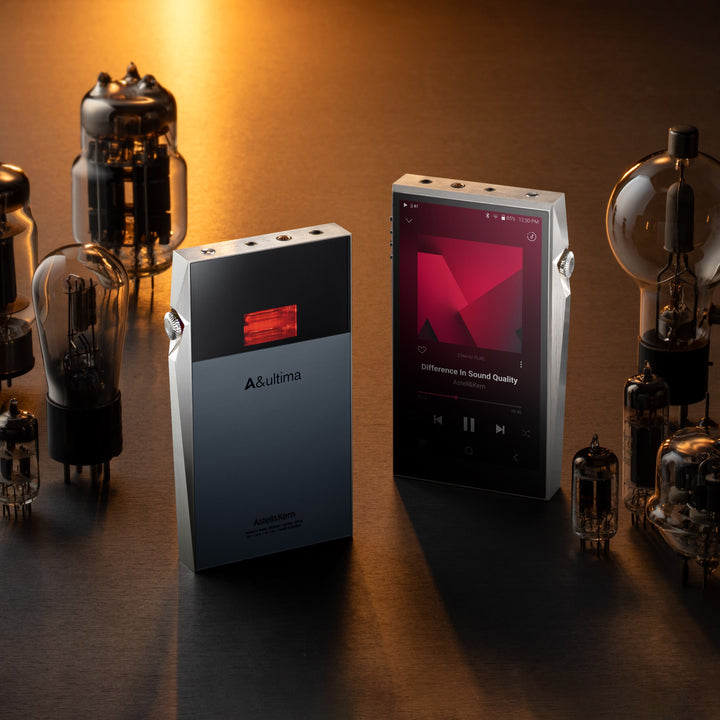 x2 Astell&Kern SP3000T units top quarter over warm background with assorted tubes