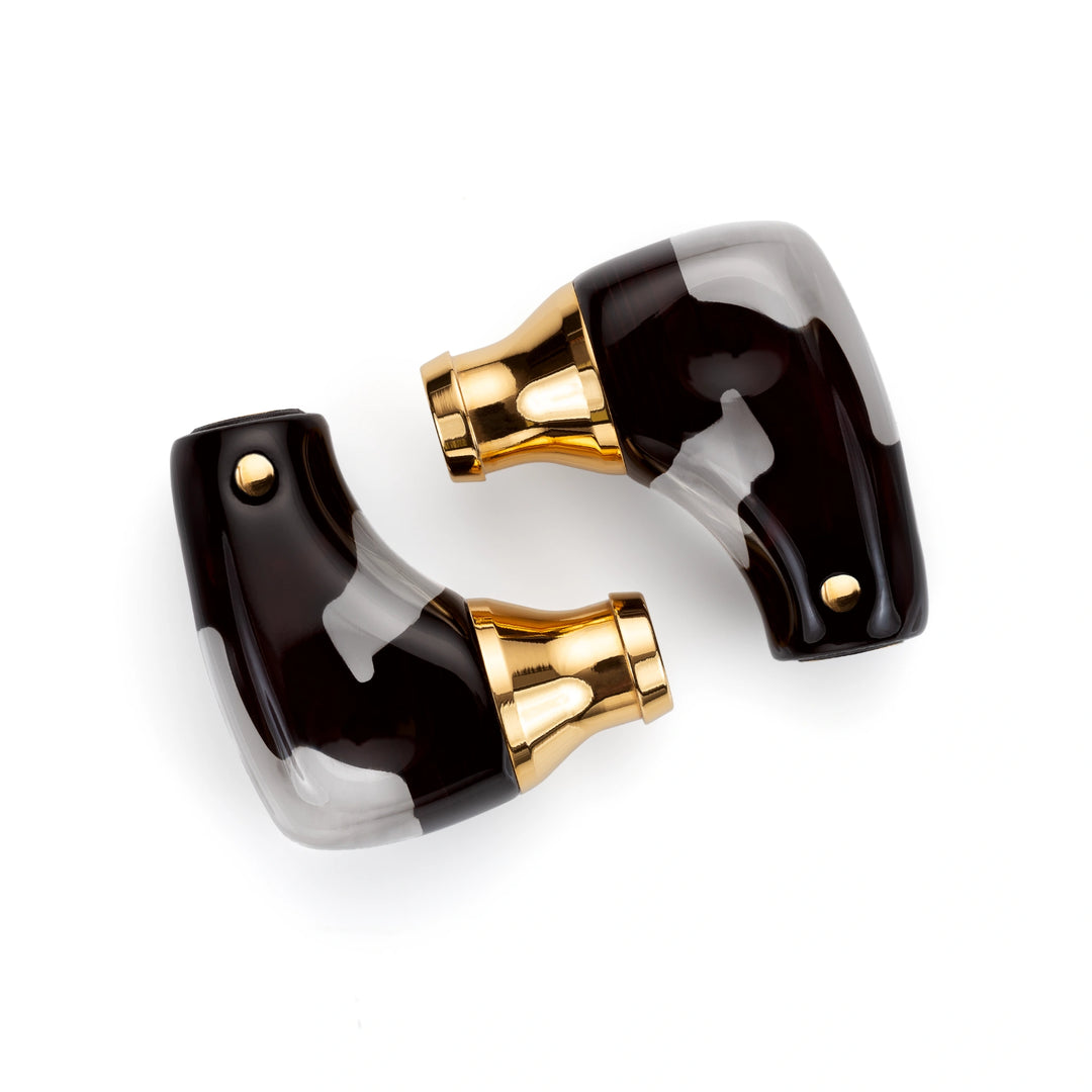 Campfire Audio Axion IEMs lying diagonally side up whitebox