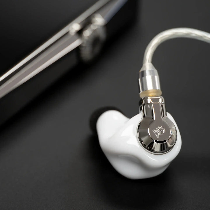 Campfire Audio Cascara MV3 over black surface with attached cable and DAP