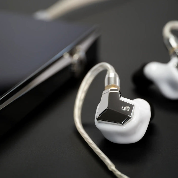 Campfire Audio Supermoon MV3 on Black table with DAP
