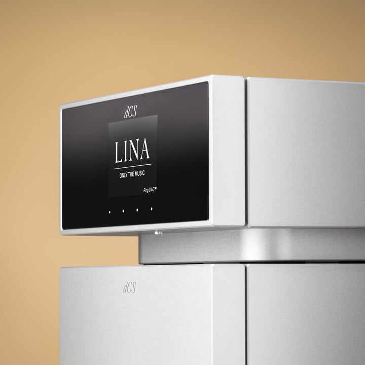 dCS Lina network DAC silver front profile 3 quarter over peach background