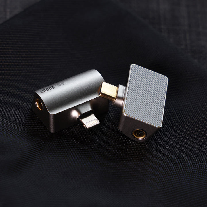 (x2) ddHiFi TC44Pro Lightning and USB-C over dark cloth background