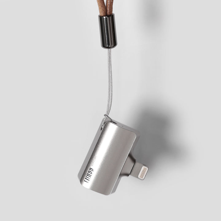 ddHiFi TC44Pro Lightning hanging from attached leather lanyard
