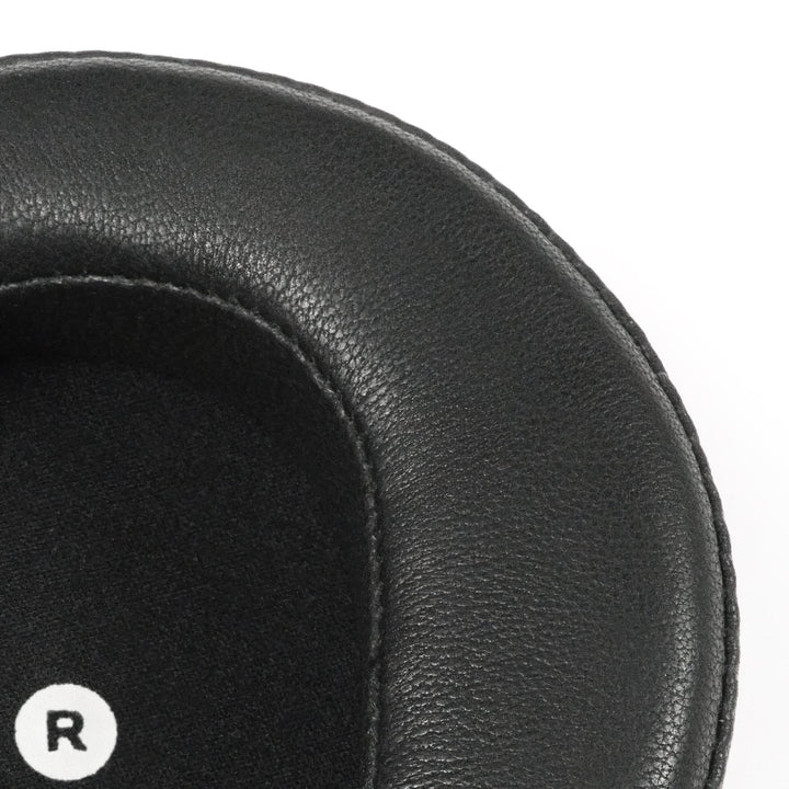 Dekoni Audio Audeze Maxwell single sheepskin earpad front corner closeup over white background