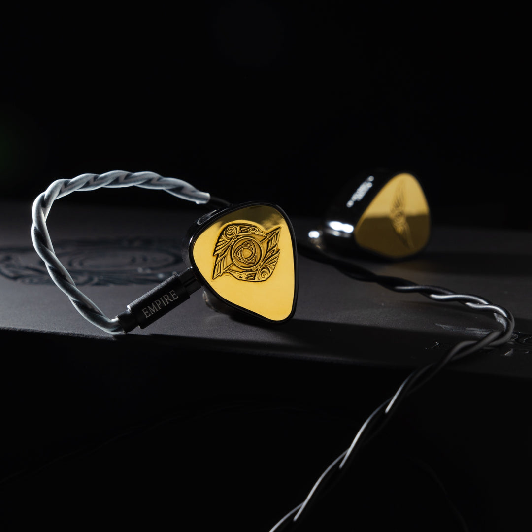 Empire Ears Raven gold launch edition dramatic with attached stock cable on retail box from ECT gallery
