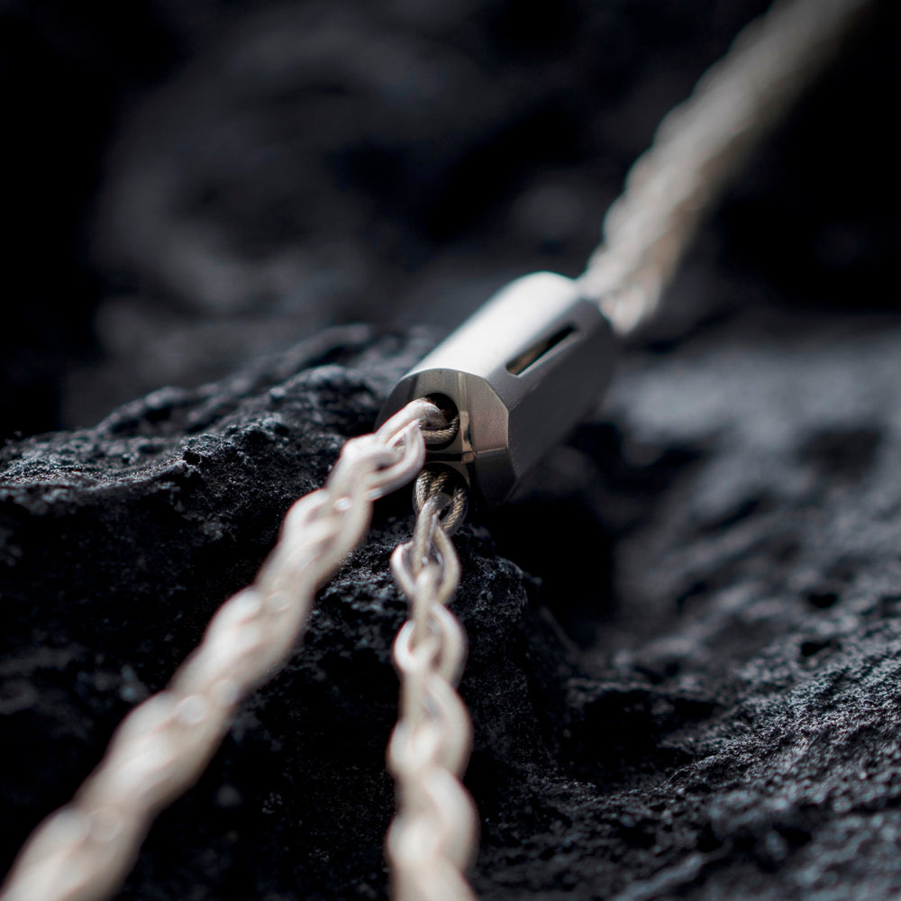 Effect Audio Centurion cable closeup of splitter over dark textured background