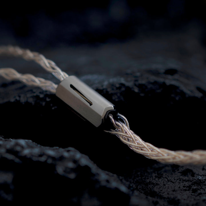 Effect Audio Centurion cable closeup of splitter profile over dark textured background