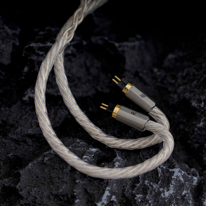 Effect Audio Centurion cable closeup of 2-pin connectors over dark textured background