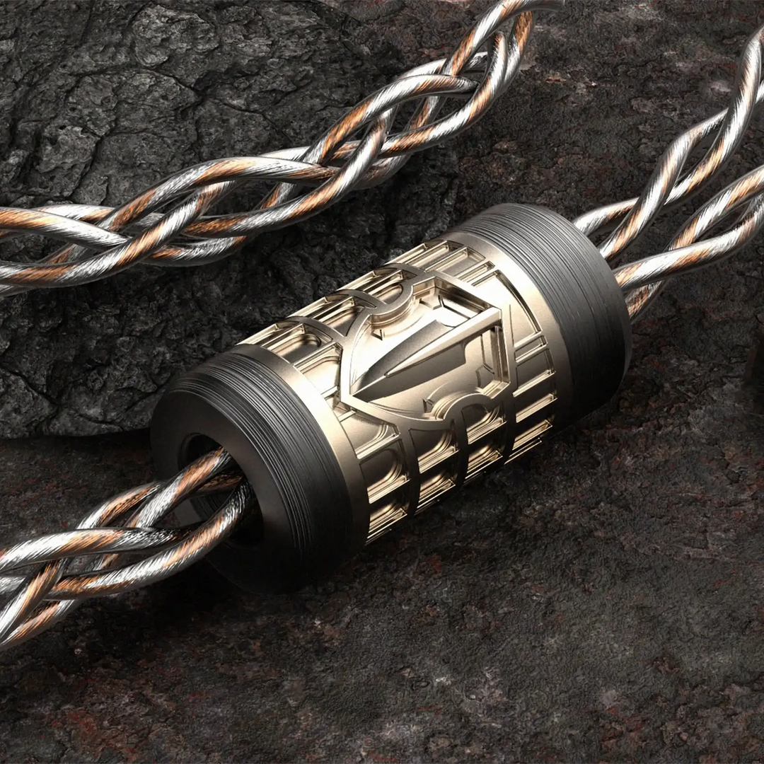 Eletech Odyssey IEM cable y-split closeup on dark stone background