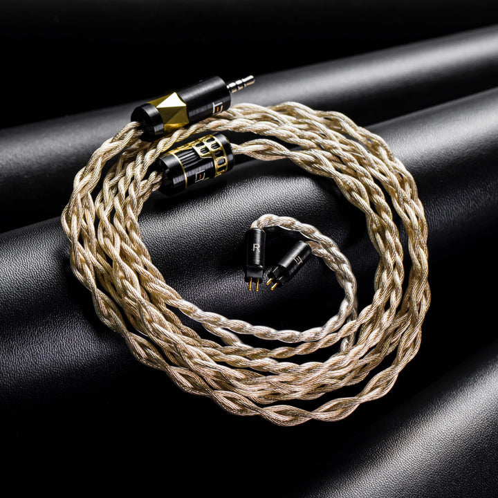 Eletech Aeneid coiled cable with 2.5mm termination and 2-pin connectors over black leather background