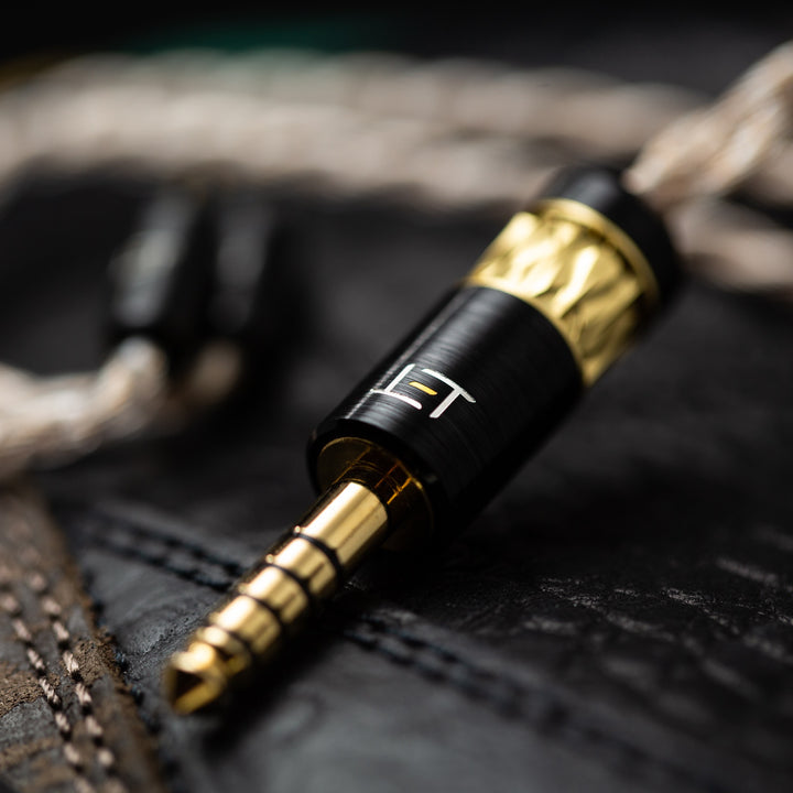 Eletech Sonnet of Adam closeup Pentaconn connector over black leather