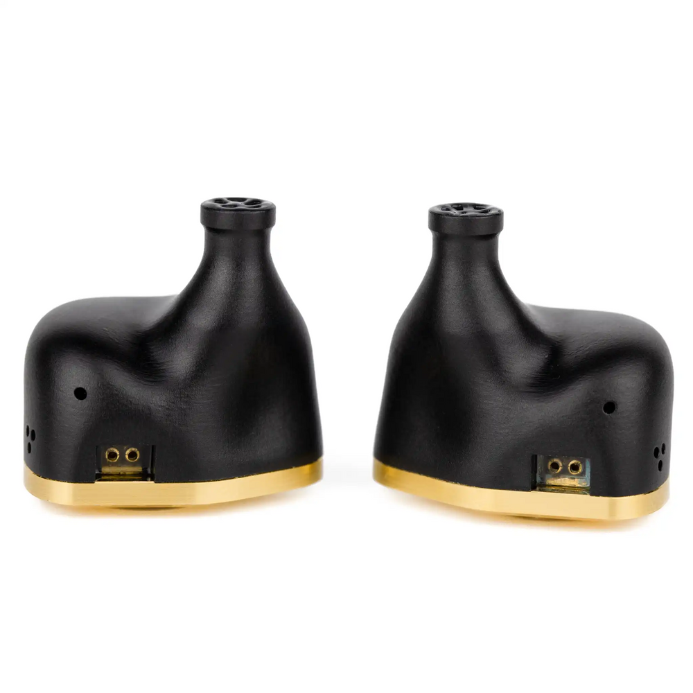 Empire Ears Odin MKII IEMs sitting face down with view of 2-pin sockets whitebox