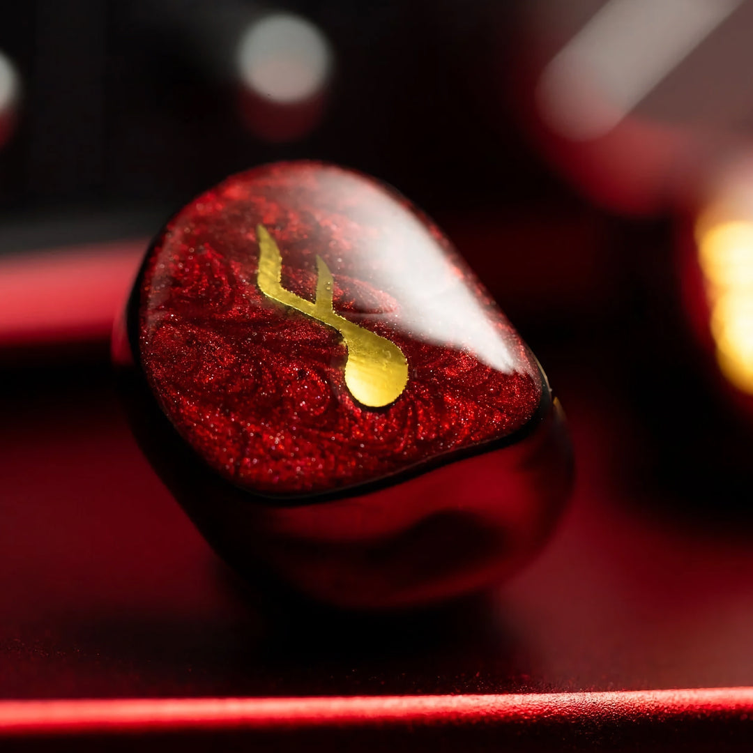 FATfreq Scarlet Mini right earphone bokeh effect extreme closeup shell
