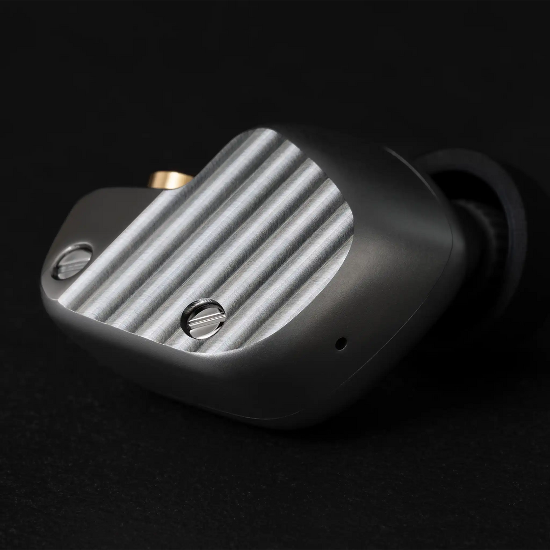Final Audio A1000 IEM closeup of faceplate wave pattern on black background