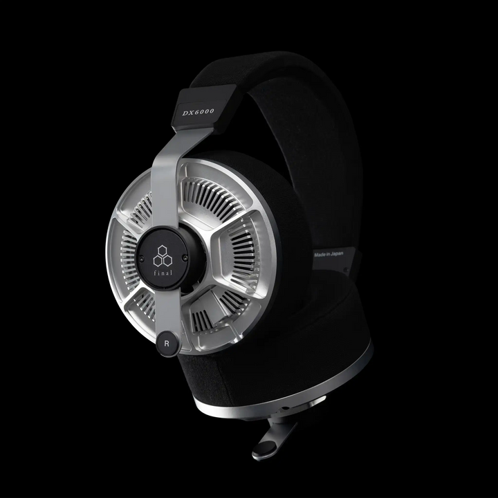 Final Audio DX6000 headphones right ear cup left 3 quarter angle rotated up on black background
