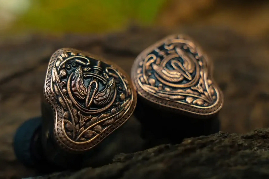 FlipEars Aegis IEMs faceplate closeup on wood log