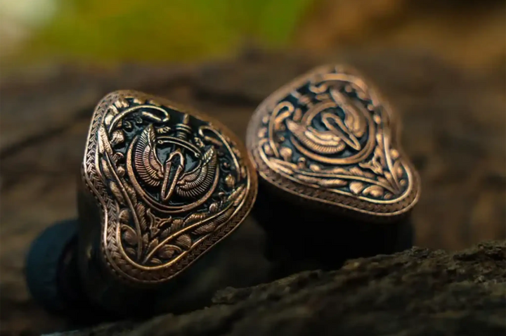 FlipEars Aegis IEMs faceplate closeup on wood log