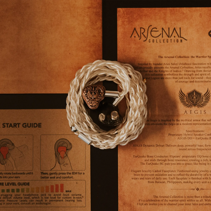 FlipEars Aegis earphones inside attached coiled stock cable over retail package paper components