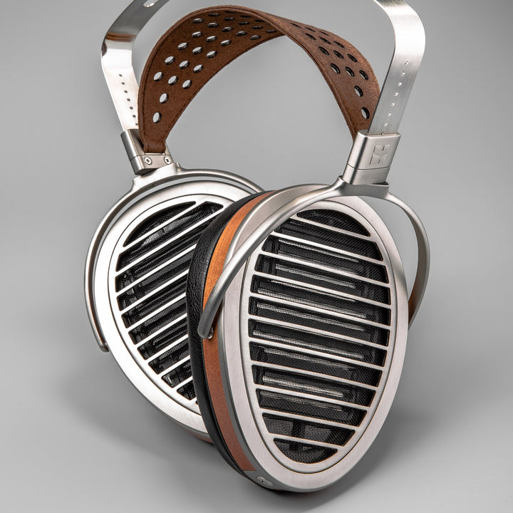 HiFiMAN HE1000 v3 Stealth front rotated earcups over gray background