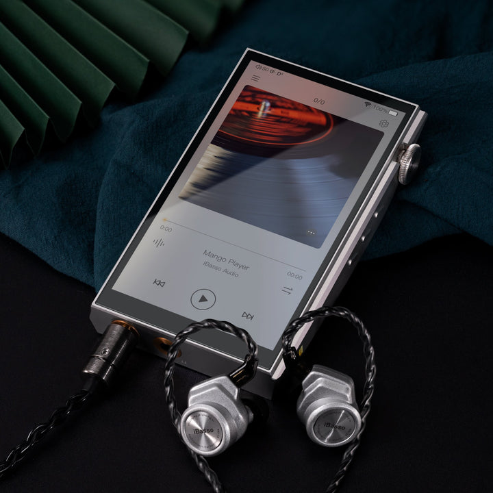 iBasso DX260 silver 3 quarter front with attached iBasso earphones