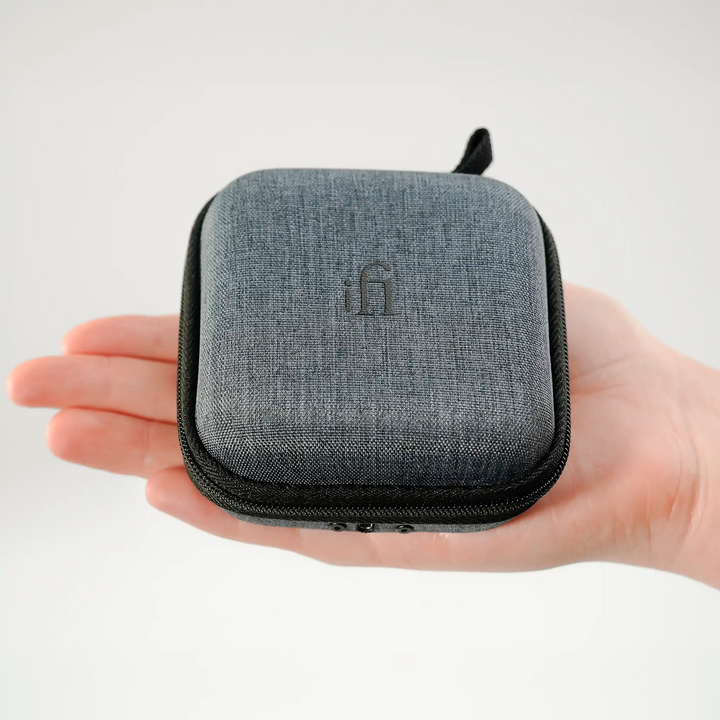 iFi Audio GO pod Air dac and amp charging case sitting in hand whitebox