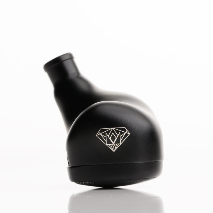 Noble Audio Onyx extreme closeup rear right earphone over white background