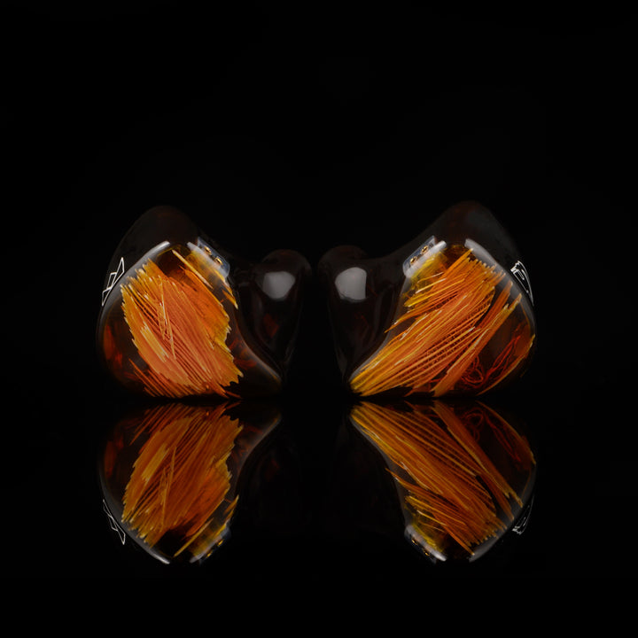 Noble Audio Spartacus IEM front over black reflective background