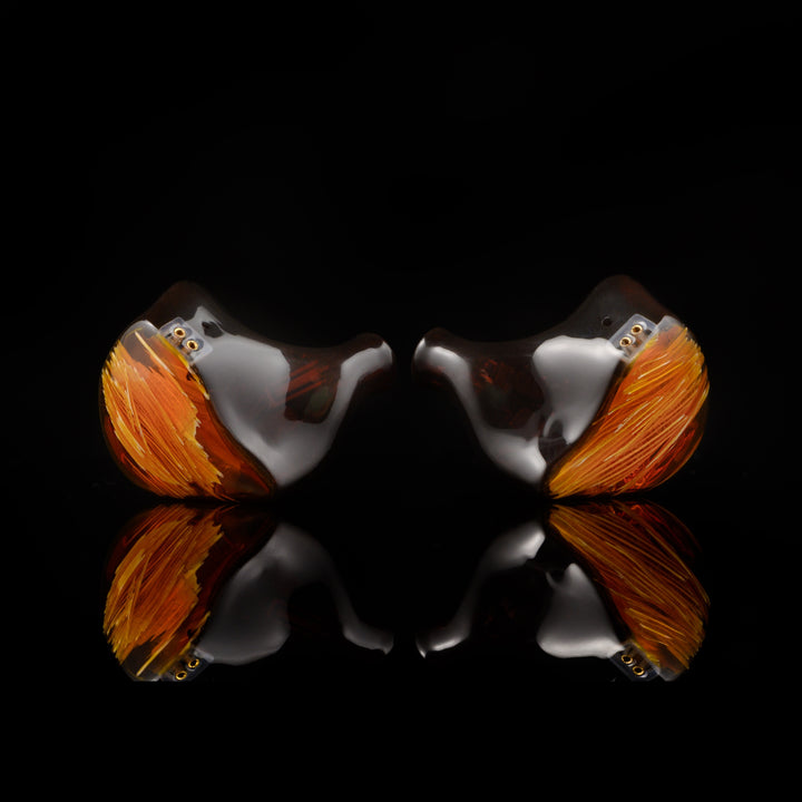 Noble Audio Spartacus IEM profile over black reflective background