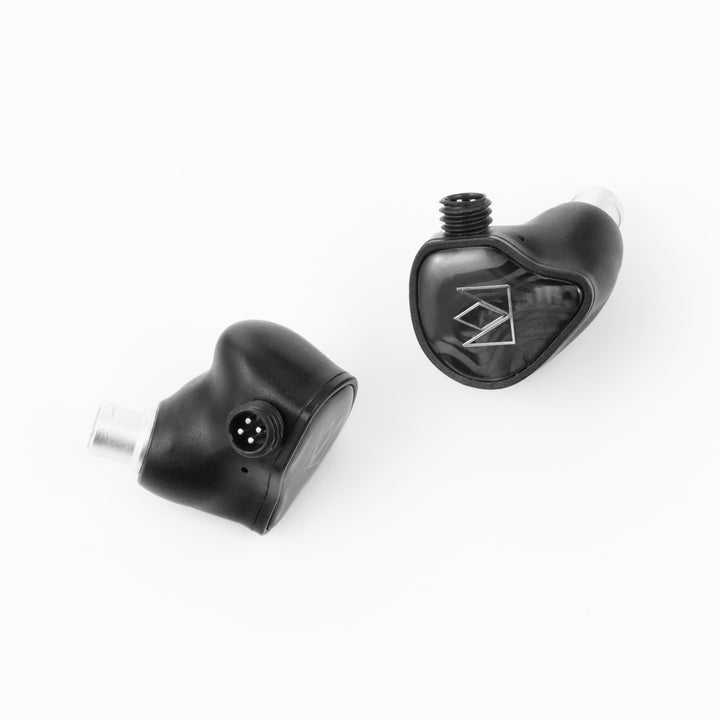 Noble Audio XM-1 front and profile 3 quarter over white reflective background