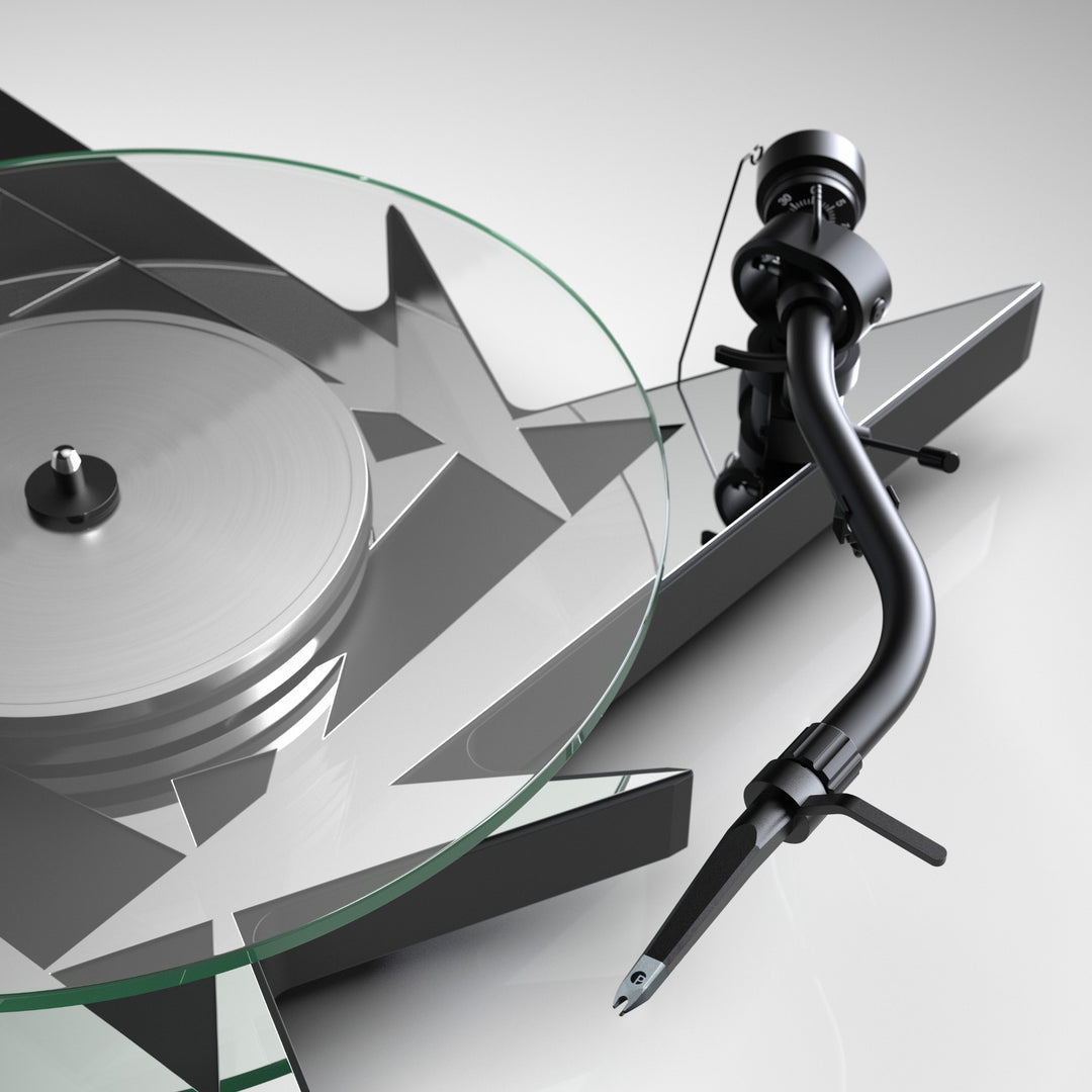 Pro-Ject Metallica turntable closeup tonearm over white background