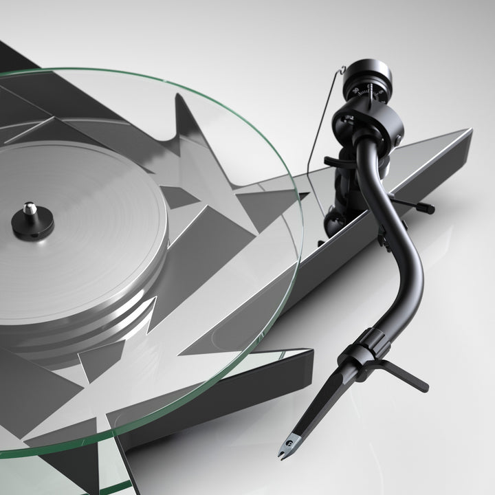 Pro-Ject Metallica turntable closeup tonearm over white background