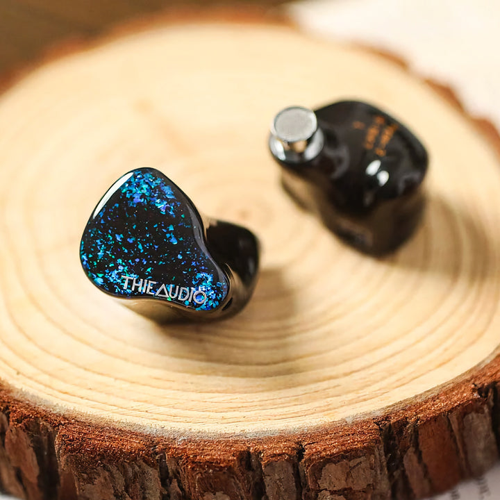 Thieaudio Hype 4 single black front over slice of pine