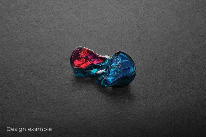 Vision Ears VE ONE IEMs sitting front and side view red and blue faceplate facing out on dark grey background