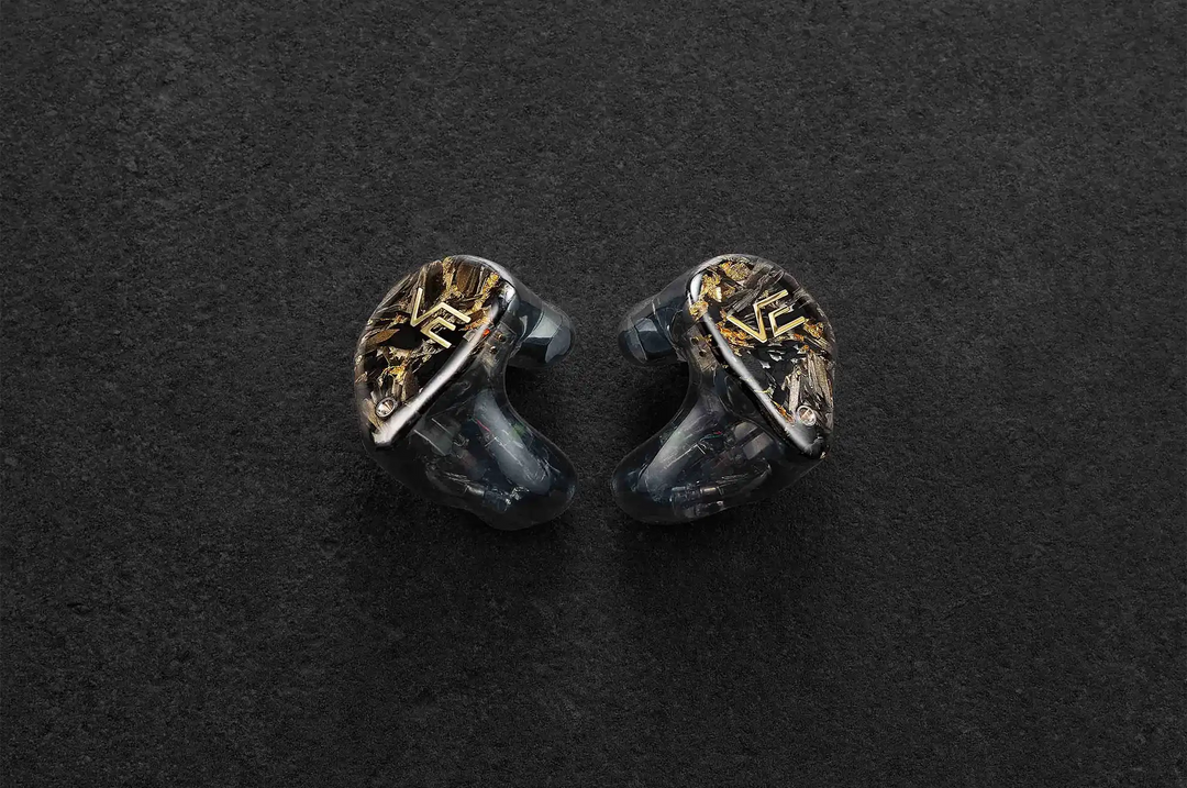 Vision Ears VE ZEN IEMs center faceplates facing out on dark grey background