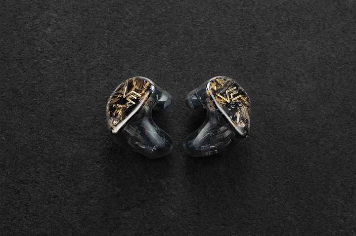 Vision Ears VE ZEN IEMs center faceplates facing out on dark grey background