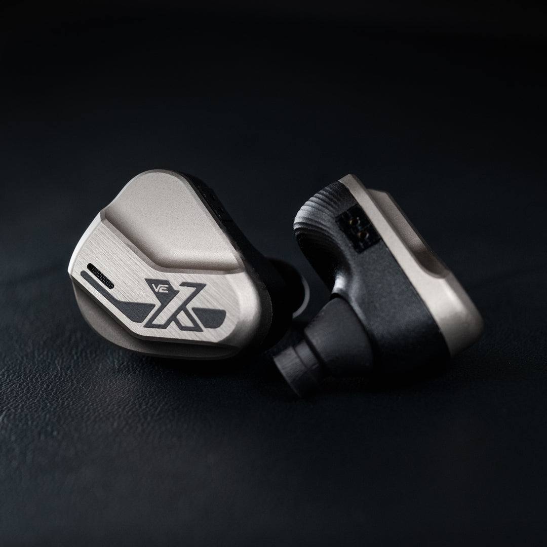 Vision Ears VE10 front and top over dark leather background