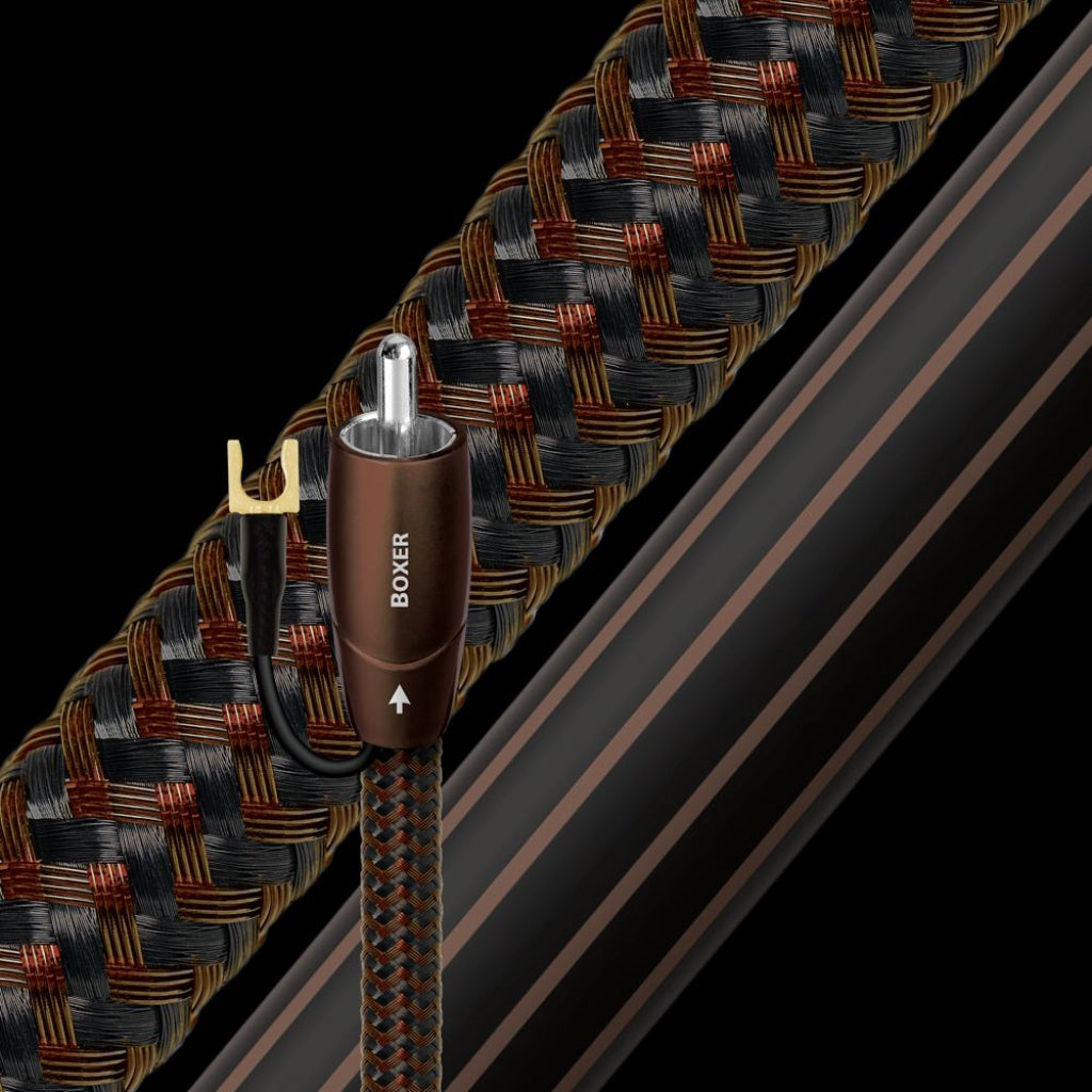 AudioQuest Boxer subwoofer cable highlighting termination and jacket over black background