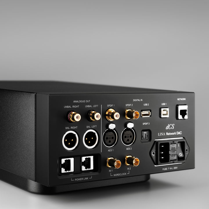 dCS Lina network DAC black left rear quarter over gray background