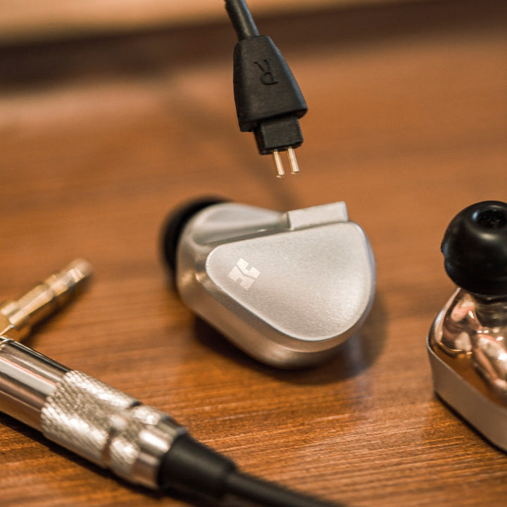 HiFiMAN Svanar earphones with detached cable highlighting connectors