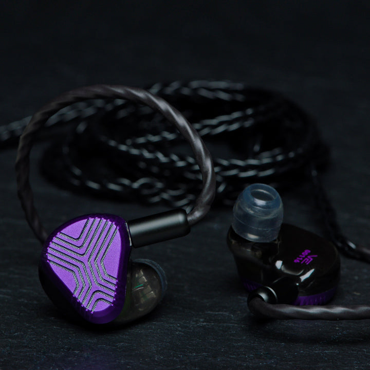 Vision Ears EXT earphones with cable over dark background