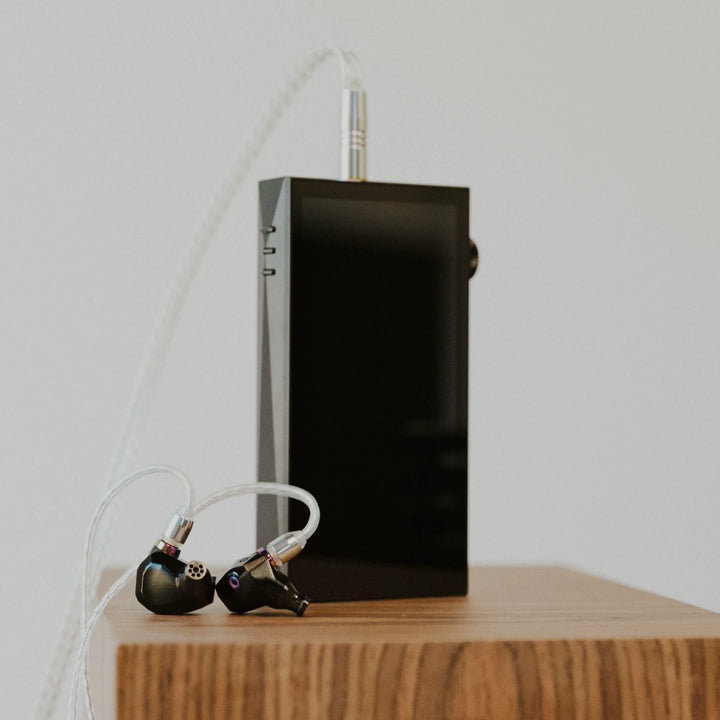 Astell&Kern SP3000M eye level with attached Campfire Audio earphones