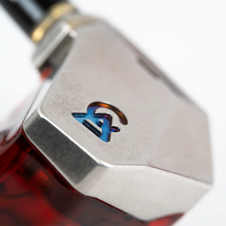Campfire Audio Grand Luna IEM extreme closeup of Campfire Audio logo on front of shell whitebox