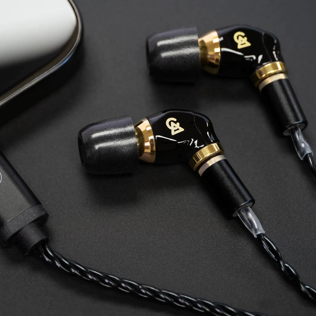 Campfire Audio MV3 Axion plugged into player with foam ear tips