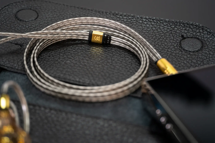 Campfire Audio Time Stream: Silver cable plugged into dap