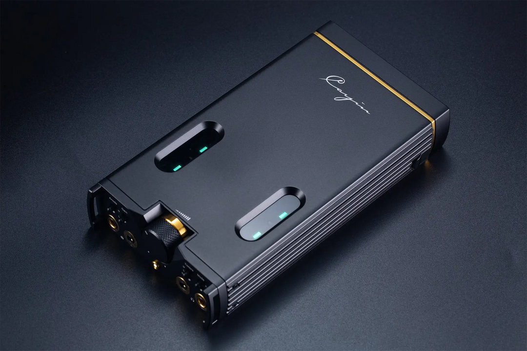 Cayin C9ii Portable Headphone Amp Birdseye view laying on black table