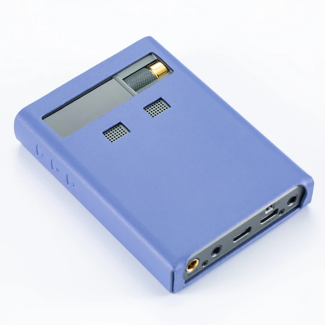 Cayin RU9 DAC/amp lying face up rotated left in leather case whitebox
