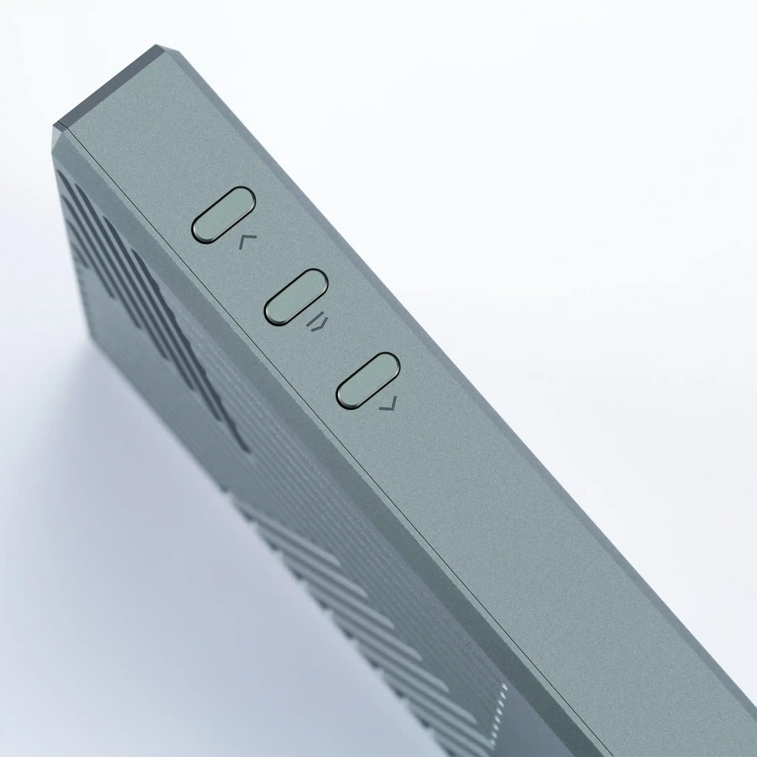Cayin RU9 DAC/amp standing on right side closeup of volume buttons whitebox