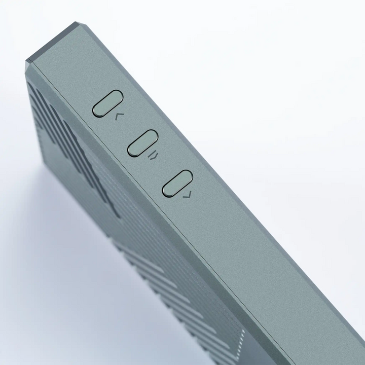 Cayin RU9 DAC/amp standing on right side closeup of volume buttons whitebox